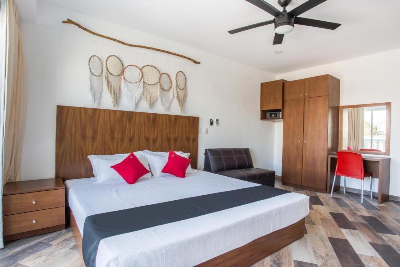 Capital O Cancun Ocean View, Cancún Buitenkant foto A bedroom at the hotel