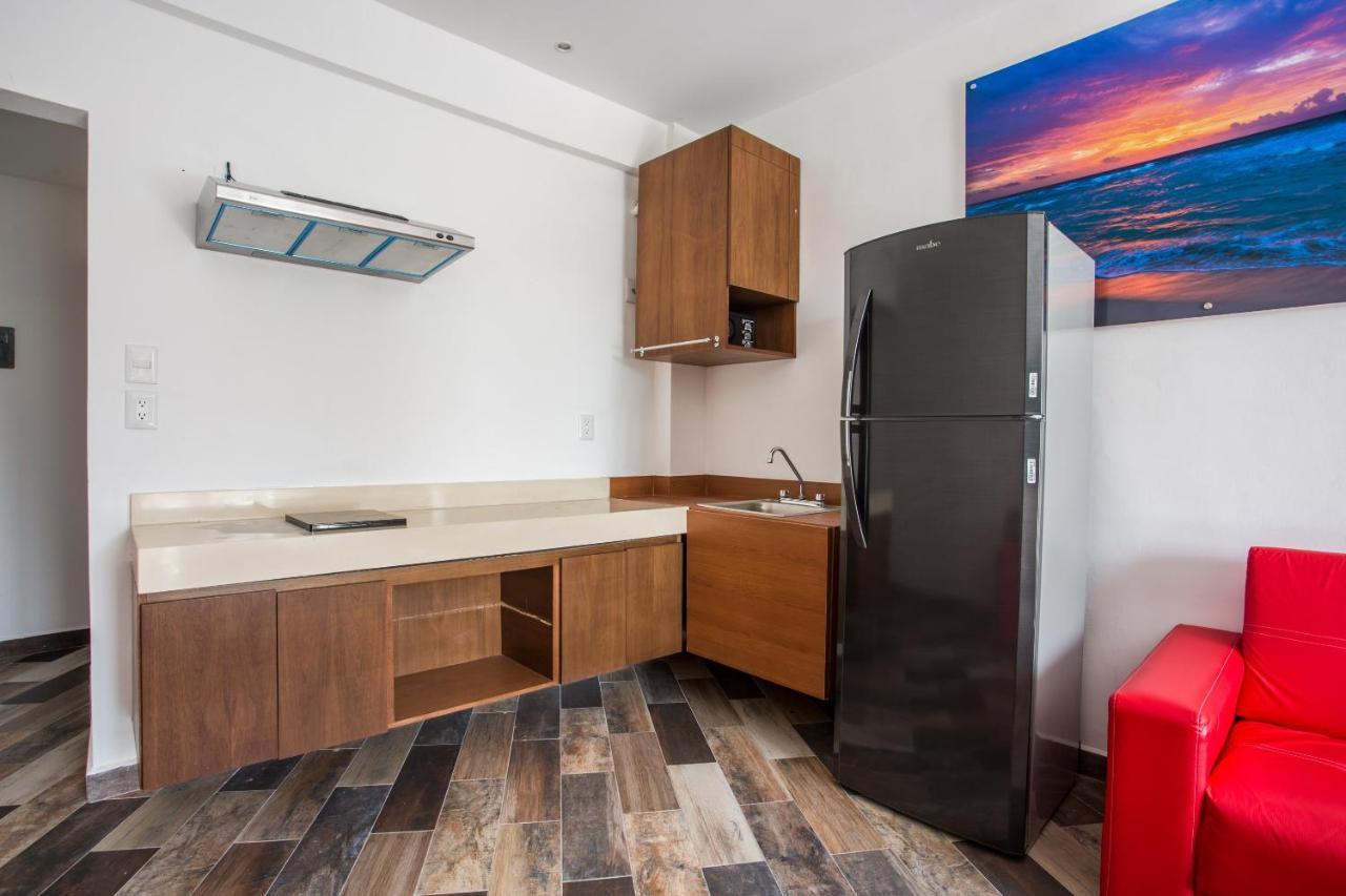 Capital O Cancun Ocean View, Cancún Buitenkant foto A typical kitchen in a studio apartment