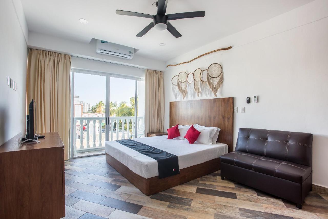 Capital O Cancun Ocean View, Cancún Buitenkant foto A typical room at the hotel